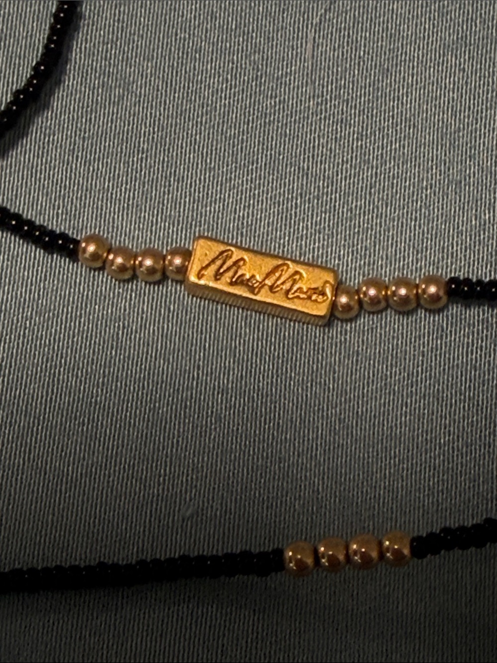 Elegant Black Beaded Layered Necklace with Gold Accents - Picture 7 of 8